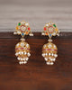 Gold domed jhumka earrings with Navratna gemstones, uncut polki diamonds, red enamel detailing, and cultured pearl fringes