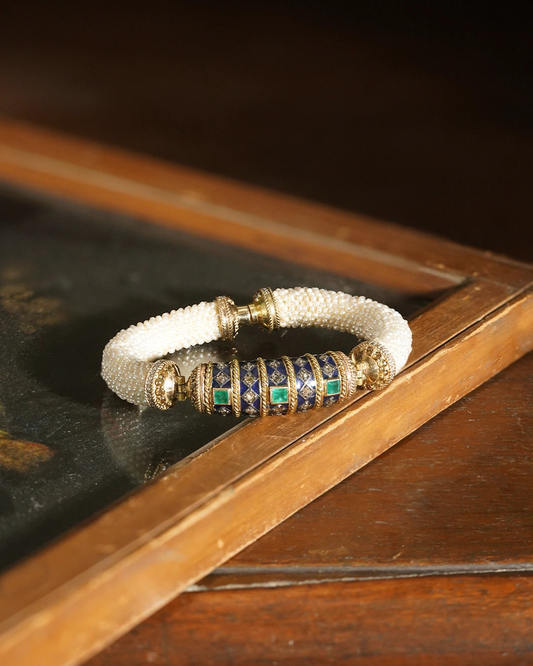 Fez bracelet crafted with natural diamonds pearls and emeralds