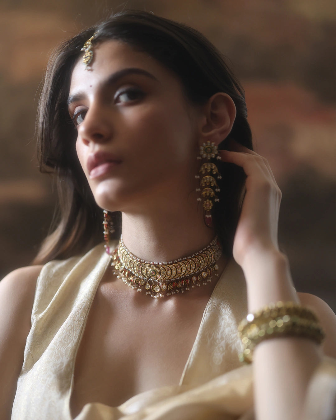 Lasya bridal choker necklace with uncut diamonds, pearls, red enamel and tourmaline in gold