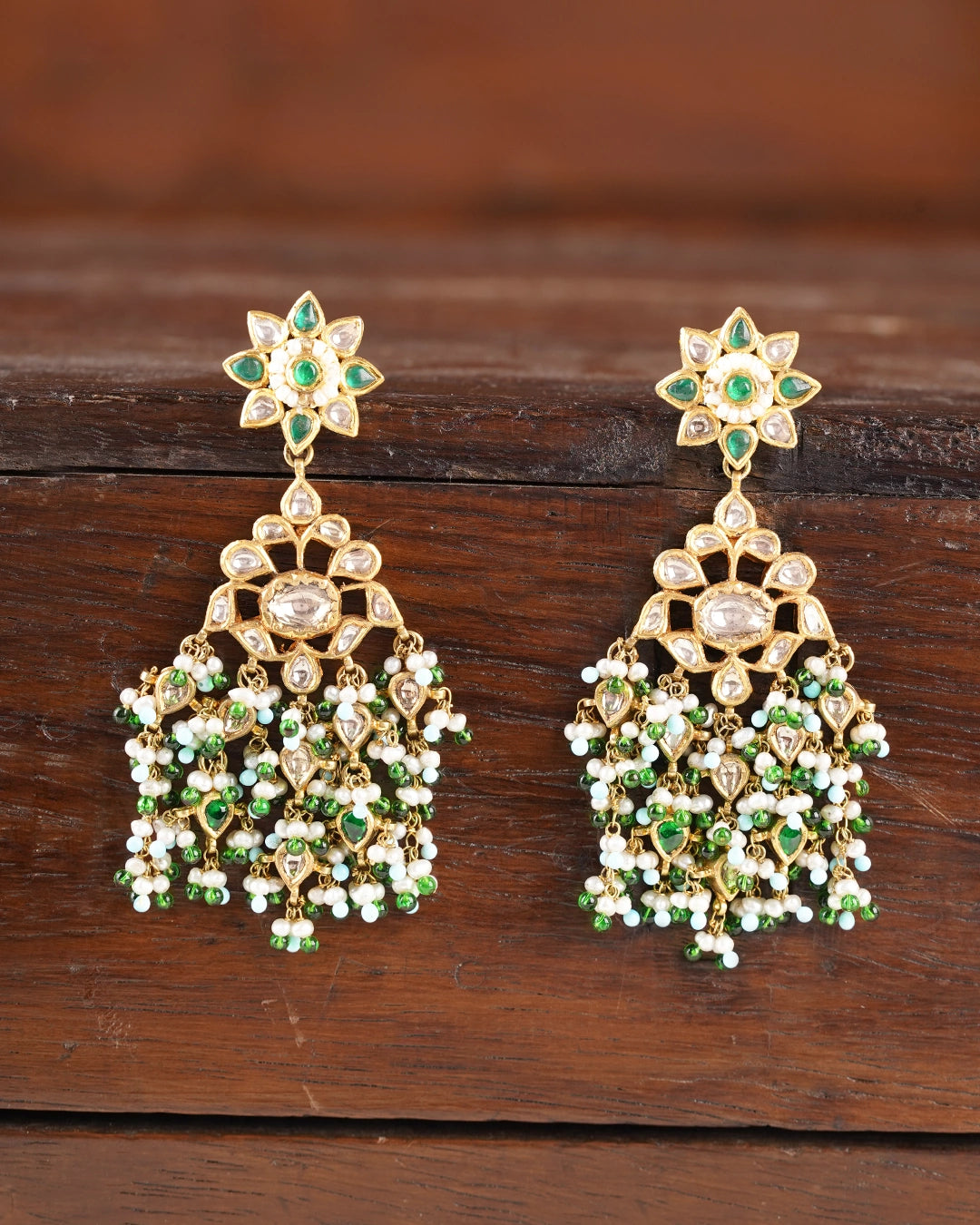 Shyama Gold Earrings with Polki Diamonds Emerald and Pearls