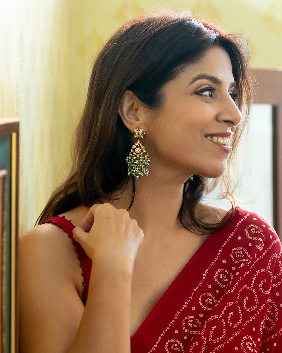 Shyama Gold Earrings with Polki Diamonds Emerald and Pearls